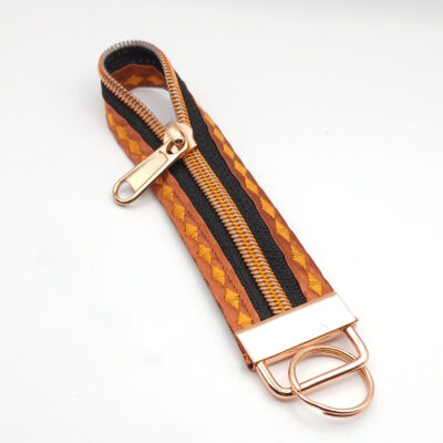 Reißverschluss-Schlüsselband S in kupfer-orange
